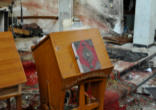 The Book of the Gospels used during the Divine Liturgy survived the brutal attack and bombing of Our Lady of Deliverance Church Image of The Book of the Gospels used during the Divine Liturgy survived the brutal attack and bombing of Our Lady of Deliverance Church