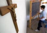 Crucifix on an Italian classroom wall Image of Crucifix on an Italian classroom wall