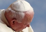 John Paul II wore a white skull cap, also called a zucchetto or pileolus Image of John Paul II wore a white skull cap, also called a zucchetto or pileolus