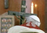 Blessed John Paul II kissing the feet of the Crucified Christ Image of Blessed John Paul II kissing the feet of the Crucified Christ