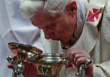 Pope Benedict XVI breathing on the Holy Chrism as a sign of the Holy Spirit Image of Pope Benedict XVI breathing on the Holy Chrism as a sign of the Holy Spirit