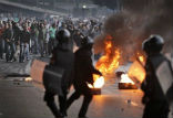 Egyptian protesters clash with police anew over the pace of reform. Image of Egyptian protesters clash with police anew over the pace of reform.