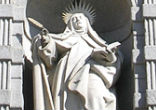 The facade of the convent centers on a statue of St. Teresa. Image of The facade of the convent centers on a statue of St. Teresa.