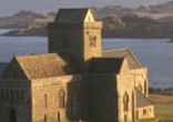 Peaceful and beautiful, Iona features rock-strewn meadows leading into sandy beaches and turquoise blue waters. Only a few structures dot the landscape.
Image of Peaceful and beautiful, Iona features rock-strewn meadows leading into sandy beaches and turquoise blue waters. Only a few structures dot the landscape.