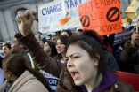 Latino activists are waiting to see Obama make long-sought immigration reforms. Image of Latino activists are waiting to see Obama make long-sought immigration reforms.