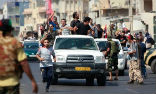 Libyan rebels celebrate the capture of Tripoli on Tuesday. Image of Libyan rebels celebrate the capture of Tripoli on Tuesday.