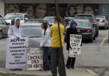 Protesters demonstrate against Planned Parenthood in North Carolina. Image of Protesters demonstrate against Planned Parenthood in North Carolina.