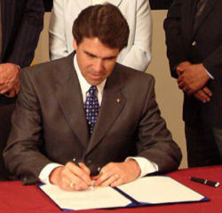 Rick Perry Sign Presidential Candidate Rick Perry Signs Pledge Opposing Same-Sex ...