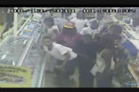 Surveillance video captures some of the gang who robbed a Maryland convenience store on Saturday. Authorities believed the crime was organized via social media. Image of Surveillance video captures some of the gang who robbed a Maryland convenience store on Saturday. Authorities believed the crime was organized via social media.