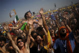 Festive pilgrims are showered with water to help relieve the 104 degree heat in Madrid. Image of Festive pilgrims are showered with water to help relieve the 104 degree heat in Madrid.