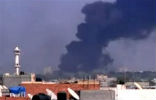 Smoke rises from Gadhafi's fortified compound in Tripoli. Rebels report its capture, but fighting is still reported. Image of Smoke rises from Gadhafi's fortified compound in Tripoli. Rebels report its capture, but fighting is still reported.