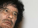Libyan rebels say they have Gaddafi surrounded, for sure this time. Image of Libyan rebels say they have Gaddafi surrounded, for sure this time.