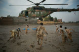 The Pakistani military delivers aid to people stranded by flooding in this archive photo. Image of The Pakistani military delivers aid to people stranded by flooding in this archive photo.