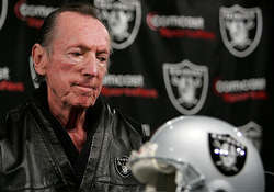 Frequently seen in a sweat-suit with slicked-back hair, Davis successfully sued to relocate his team from Oakland to L.A. in 1982, then abruptly moved it back to Oakland 13 years later. Frequently seen in a sweat-suit with slicked-back hair, Davis successfully sued to relocate his team from Oakland to L.A. in 1982, then abruptly moved it back to Oakland 13 years later.