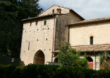 The southeast corner leads behind the church to the Chapel of St. Thomas, which incorporates the hostel where St. Thomas Aquinas stayed and died in 1274. Image of The southeast corner leads behind the church to the Chapel of St. Thomas, which incorporates the hostel where St. Thomas Aquinas stayed and died in 1274.