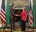 Mutassim Gaddafi and Hillary Clinton. Image of Mutassim Gaddafi and Hillary Clinton.