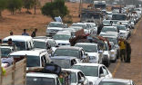Residents of Sirte fleeing in their cars during the cease-fire. Image of Residents of Sirte fleeing in their cars during the cease-fire.