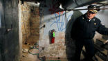 Police Commissioner Charles Ramsey next to the entrance of the dungeon. Image of Police Commissioner Charles Ramsey next to the entrance of the dungeon.