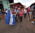 A few of Ortega's followers rally in the streets. Image of A few of Ortega's followers rally in the streets.