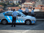Police in Portugal are increasingly common sight in urban areas, as they focus on revenue-generating activities, and neglect outlying districts. Image of Police in Portugal are increasingly common sight in urban areas, as they focus on revenue-generating activities, and neglect outlying districts.