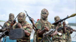 Boko Haram fighters, hiding their identity, as they inflict terror on innocent people in the name of Allah Boko Haram fighters, hiding their identity, as they inflict terror on innocent people in the name of Allah