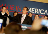 A victorious Rick Santorum addresses a crowd Image of A victorious Rick Santorum addresses a crowd
