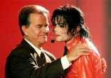 Dick Clark, pictured with Michael Jackson, ushered a host of popular musicians into America's living rooms with Image of Dick Clark, pictured with Michael Jackson, ushered a host of popular musicians into America's living rooms with