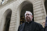 The embattled Monsignor Lynn leaves a Philadelphia courthouse. Image of The embattled Monsignor Lynn leaves a Philadelphia courthouse.