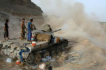 Yemeni soldiers fight from a fixed position in a recent clash with Al Qaeda fighters. Image of Yemeni soldiers fight from a fixed position in a recent clash with Al Qaeda fighters.