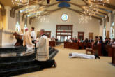 The new priests hands being annointed with holy Chrism by the Bishop. All photos taken by and provided with great generosity by Dave Barron. Image of The new priests hands being annointed with holy Chrism by the Bishop. All photos taken by and provided with great generosity by Dave Barron.