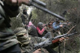 Rebels from the Idlib Province prepare for an ambush earlier in the year, in this file photo. Image of Rebels from the Idlib Province prepare for an ambush earlier in the year, in this file photo.