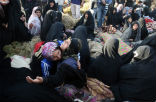 Victims of the quake try to comfort one another amid the grief and the aftershocks. Image of Victims of the quake try to comfort one another amid the grief and the aftershocks.