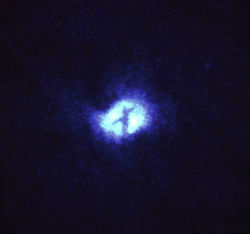 When we look to the cosmos, we cannot help but see God. This image is of the core of M51, the 'Whirlpool Galaxy' in Ursa Major. The cross is likely formed by lanes of dust obscuring the light from the galactic core of the galaxy, where a super-massive black hole resides. When we look to the cosmos, we cannot help but see God. This image is of the core of M51, the 'Whirlpool Galaxy' in Ursa Major. The cross is likely formed by lanes of dust obscuring the light from the galactic core of the galaxy, where a super-massive black hole resides.