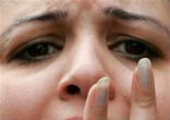 Grieving Coptic Woman Image of Grieving Coptic Woman