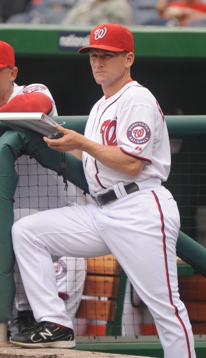 Perched atop the team dugout steps, Rick Eckstein watches his hitters. (Photo courtesy of Washington Nationals) Perched atop the team dugout steps, Rick Eckstein watches his hitters. (Photo courtesy of Washington Nationals)