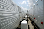 Unused FEMA trailers sit idle along with displaced residents in New York. Image of Unused FEMA trailers sit idle along with displaced residents in New York.