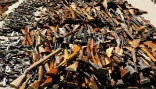 Some of the guns exchanged for groceries. Image of Some of the guns exchanged for groceries.