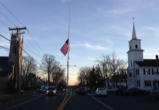 Flag in Newtown reflects our National vigil Image of Flag in Newtown reflects our National vigil
