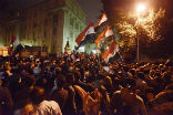 Egyptian protesters gather outside of the presidential palace to protest Mohammed Morsi's new powers. Image of Egyptian protesters gather outside of the presidential palace to protest Mohammed Morsi's new powers.