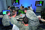 Army students train for the next war using computers instead of rifles. Image of Army students train for the next war using computers instead of rifles.