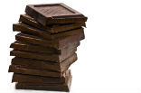 It's hard to be sad when you have a stack of chocolate to enjoy. Image of It's hard to be sad when you have a stack of chocolate to enjoy.