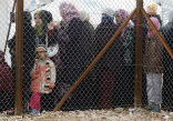 Refugee camps are so overcrowded many people can no longer get in. Image of Refugee camps are so overcrowded many people can no longer get in.