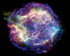The glowing gas and dust remnants of a type IA supernova are seen in this false-color image. Image of The glowing gas and dust remnants of a type IA supernova are seen in this false-color image.