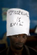 A supporter of the bill provides his opinion on the matter during a public demonstration. Image of A supporter of the bill provides his opinion on the matter during a public demonstration.