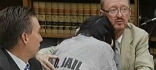 Corby cries in her lawyer's arms as she is sentenced. Image of Corby cries in her lawyer's arms as she is sentenced.