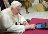 Pope Benedict XVI 'tweeting' to the faithful around the globe Image of Pope Benedict XVI 'tweeting' to the faithful around the globe