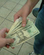The website is overt that money will be exchanged. Image of The website is overt that money will be exchanged.