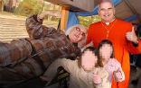 Former cardinal Keith O'Brien with Jimmy Sevile and two unidentified children. Police suspect the late Sevile is one of the country's worst serial sexual predators. Image of Former cardinal Keith O'Brien with Jimmy Sevile and two unidentified children. Police suspect the late Sevile is one of the country's worst serial sexual predators.