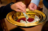 It remains to be seen if parishioners will pay the costs of the scandal. Image of It remains to be seen if parishioners will pay the costs of the scandal.