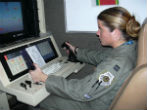 Drones are now widely used in military operations. This image shows an Air Force Captain piloting a drone over Iraq in 2004. Image of Drones are now widely used in military operations. This image shows an Air Force Captain piloting a drone over Iraq in 2004.